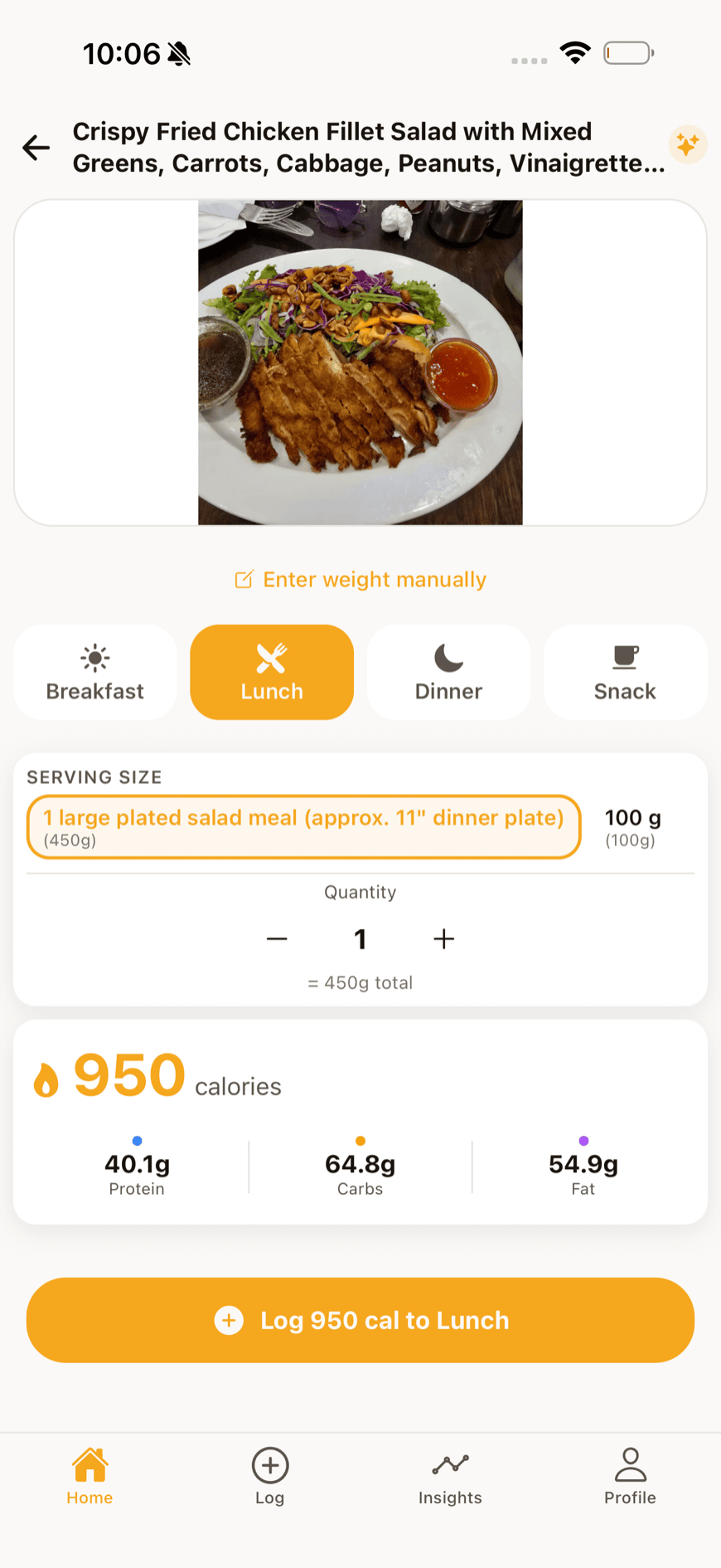 Meal logging screen showing the result of an AI photo scan with calories and macros filled in.